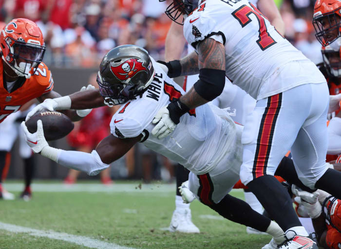 Sep 17, 2023; Tampa, Florida, USA; Tampa Bay Buccaneers running back Rachaad White (1) scores a touchdown against the Chicago Bears during the second quarter at Raymond James Stadium. Mandatory Credit: Kim Klement Neitzel-USA TODAY Sports